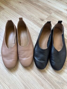 Everlane Slip-On Leather Flats in Black and Tan. Includes both pairs.
